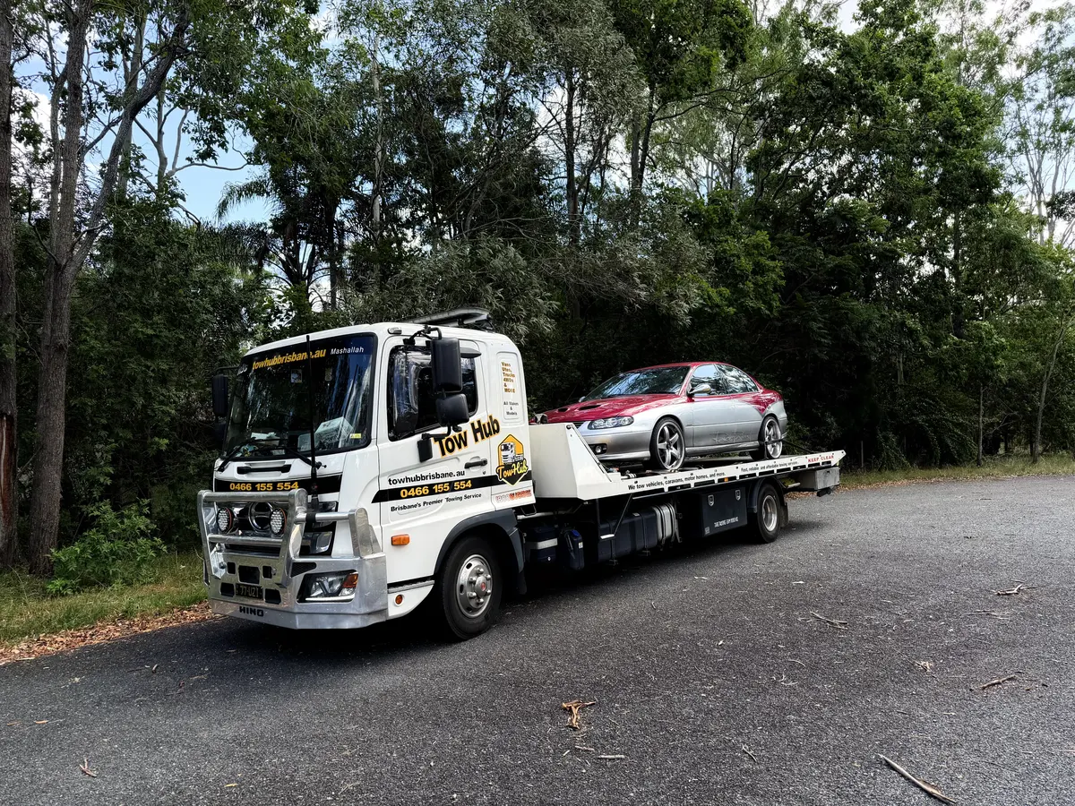 Clubsport on Tow Hub flatbed at service station