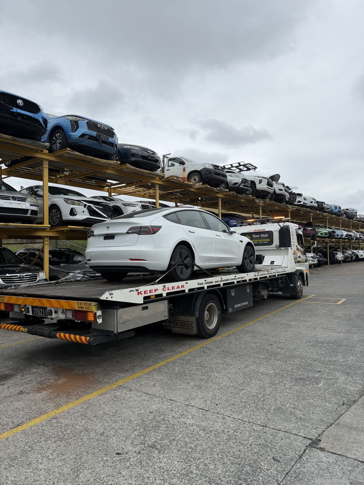 Tesla Model 3 on Tow Hub Brisbane flatbed truck